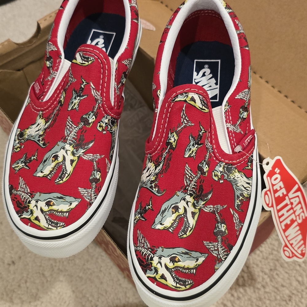 Vans Red Canvas Slip-On Sneakers with Dinosaur Print